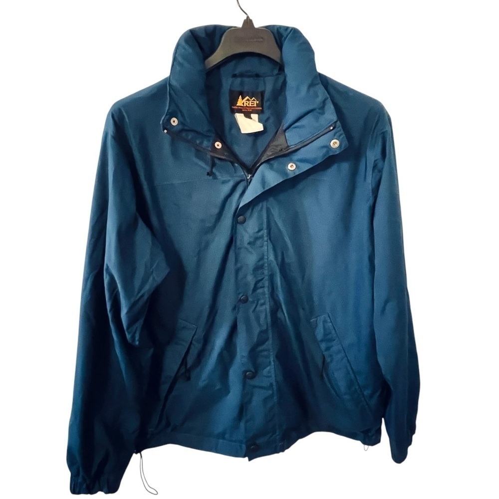 REI Men’s jacket size medium midnight, blue hidden hood